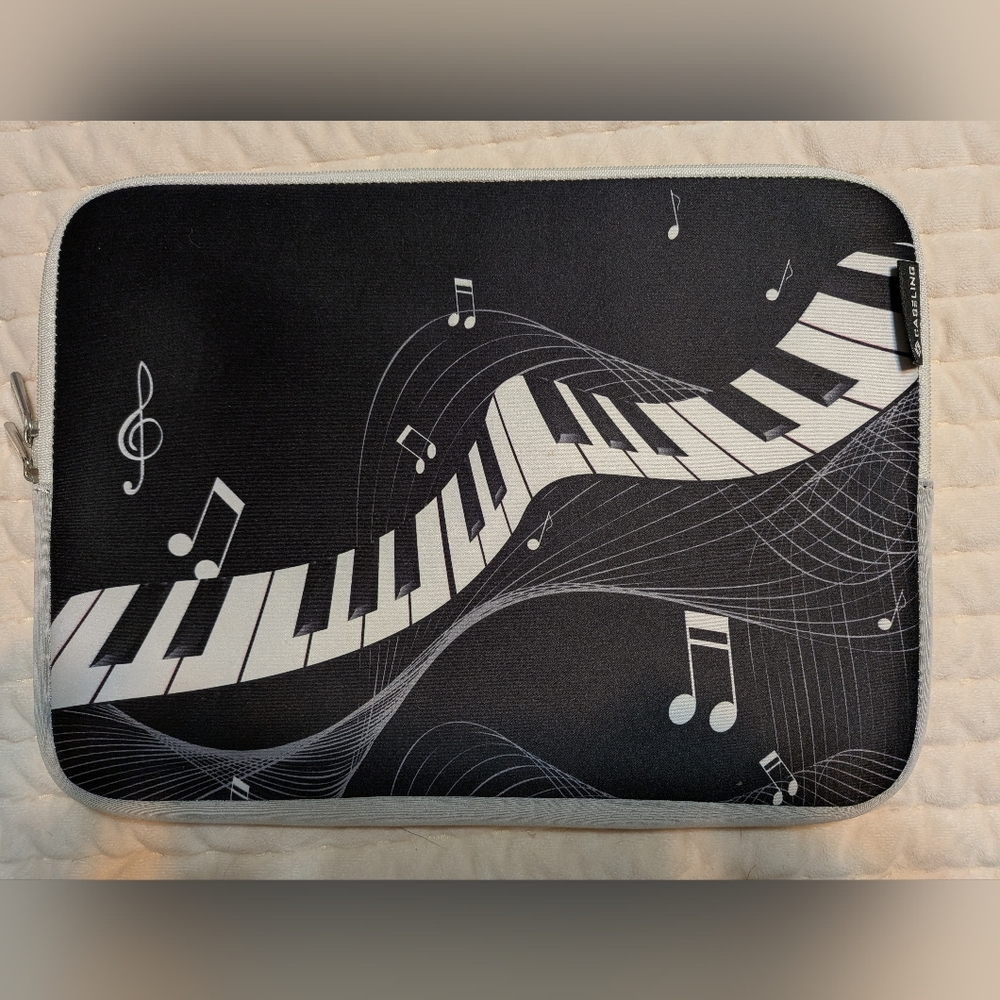 Casetify Black Tablet Sleeve with White Piano Keyboard & Music Notes